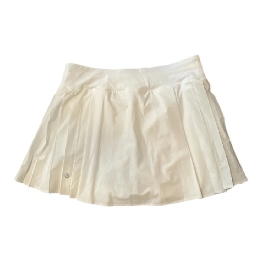 #090, Lululemon side-pleat high-rise tennis skirt, size 8